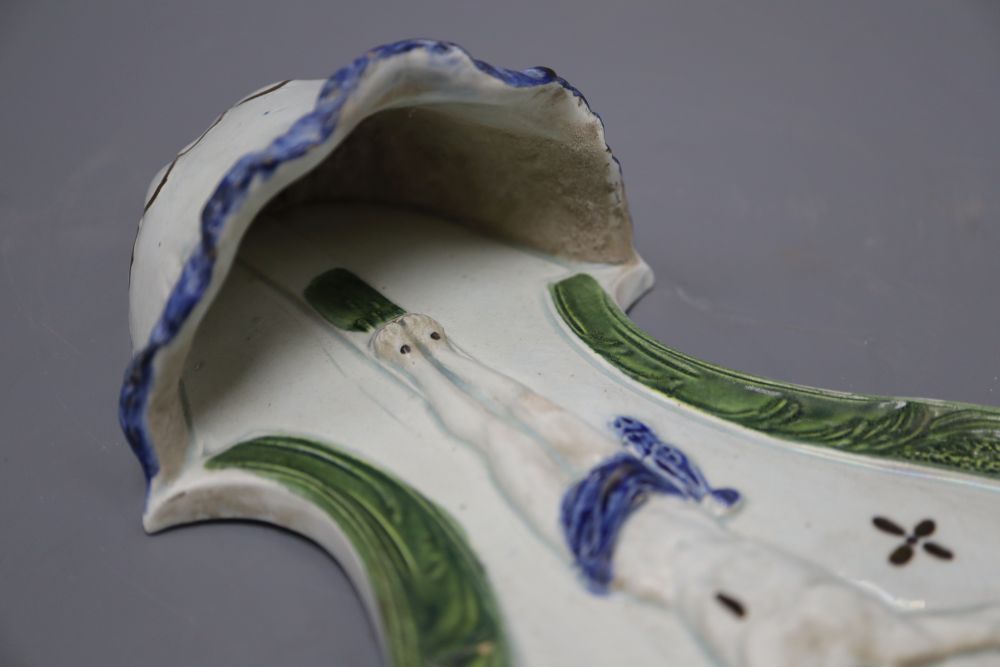 An early 19th century pearlware holy water scoop, length 24cm